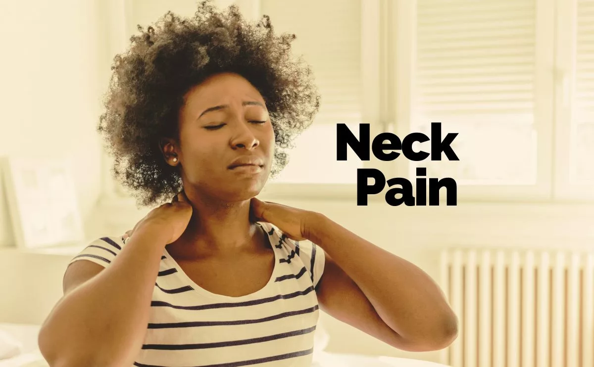 Woman clutching her neck in pain, illustrating the discomfort of neck pain, treated at Rincon Chiropractic.