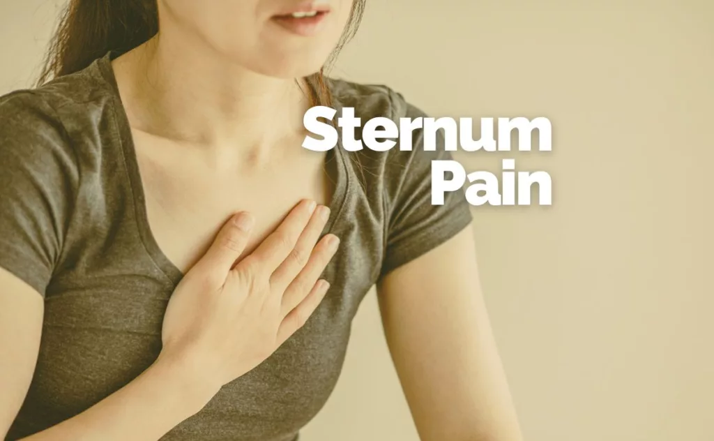 Woman clutching her chest in pain representing the focus of Rincon Chiropractic's sternum pain treatment.